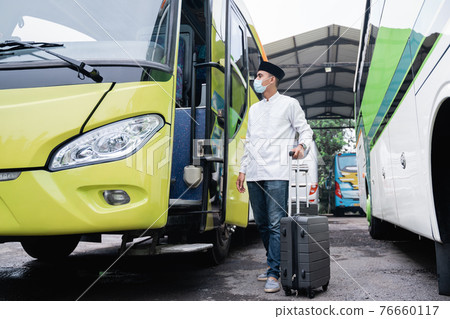 male muslim travel by bus during pandemic 76660117