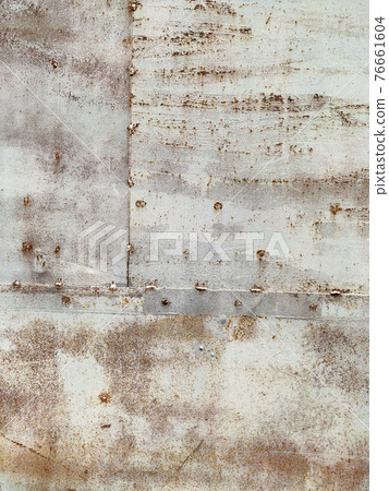 Rusty metal background with streaks of rust. Corroded metal background. Rust stains. Rystycorrosion. 76661604