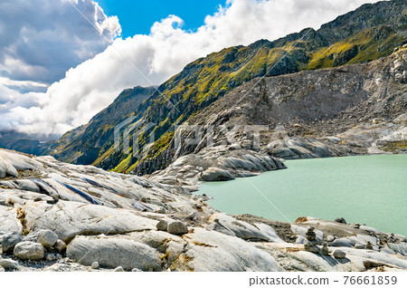 The Rhone Glacier, the source of the Rhone at Furka Pass in Switzerland The Rhone Glacier, the source of the Rhone at Furka Pass in Switzerland 76661859