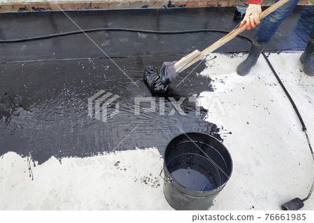 Isolation and waterproofing of the foundation of the building on the territory of the cottage settlement construction. 76661985