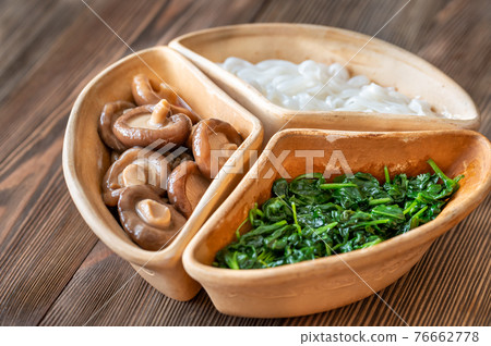 Bowl with rice noodles, mushrooms and spinach Bowl with rice noodles, mushrooms and spinach 76662778