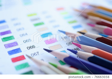 Colored pencils are on color palette with numbers 76663038
