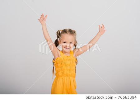 Portrait of a beautiful and confident girl isolated on white Portrait of a beautiful and confident girl isolated on white 76663384