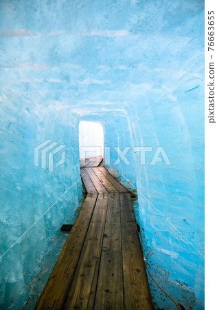 Ice cave inside the Rhone Glacier at Furka Pass in Switzerland Ice cave inside the Rhone Glacier at Furka Pass in Switzerland 76663655