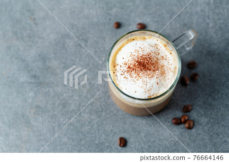 Appetizing fresh cappuccino in cup 76664146