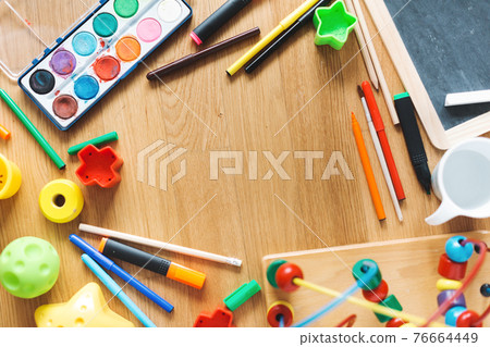 Kids concept with drawing tools Kids concept with drawing tools 76664449