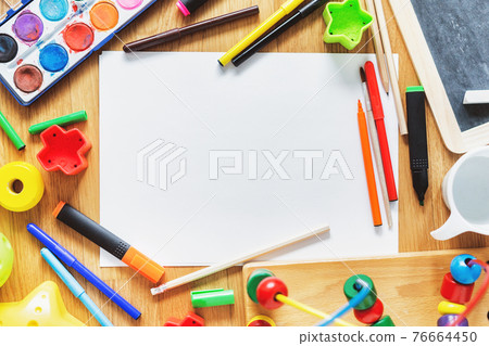 Kids concept with drawing tools Kids concept with drawing tools 76664450