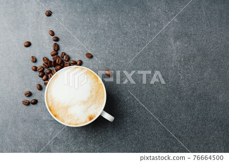 Appetizing fresh cappuccino in cup Appetizing fresh cappuccino in cup 76664500