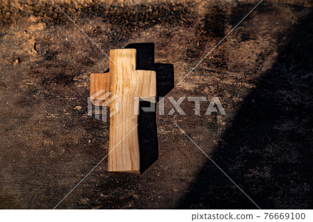 Wooden cross in the sunset during Easter and Lent 76669100