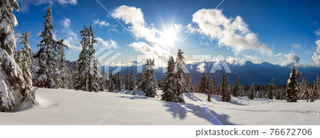 View of Canadian Nature Landscape on top of snow covered mountain View of Canadian Nature Landscape on top of snow covered mountain 76672706