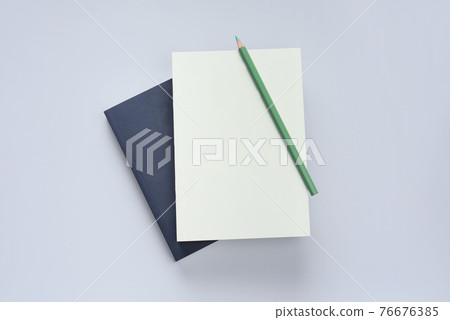 flat lay book and stationery 76676385