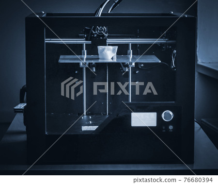Objects printed by 3d printer. Automatic three dimensional 3d printer performs Objects printed by 3d printer. Automatic three dimensional 3d printer performs 76680394