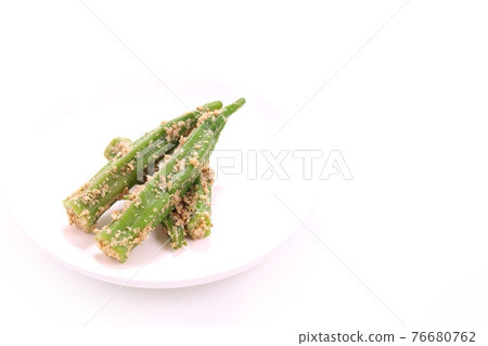 Boiled okra with sesame sauce, bright background Boiled okra with sesame sauce, bright background 76680762