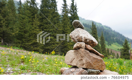 Pile of stones in the mountains - tour. Pile of stones in the mountains - tour. 76684975