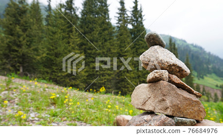 Pile of stones in the mountains - tour. Pile of stones in the mountains - tour. 76684976