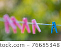 clothespins on a rope 76685348