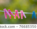 clothespins on a rope 76685350