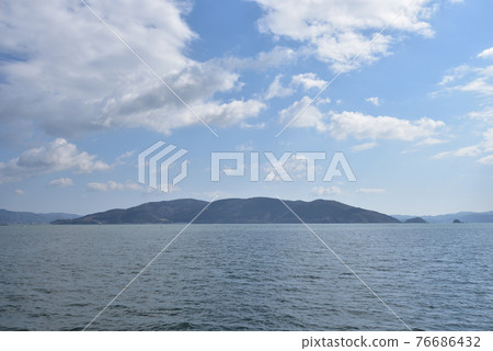 Ishinomaki City Oshika Peninsula seen from offshore towards Kodakehama Fishing Port 76686432
