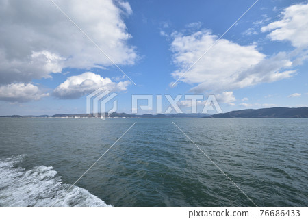 Ishinomaki City Oshika Peninsula seen from offshore towards Kodakehama Fishing Port 76686433