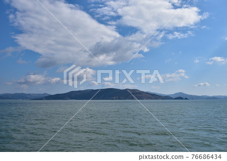 Ishinomaki City Oshika Peninsula seen from offshore towards Kodakehama Fishing Port 76686434