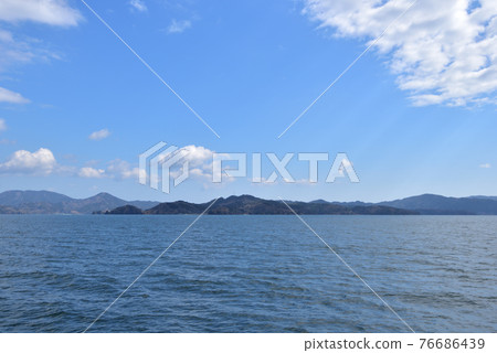 Ishinomaki City Oshika Peninsula seen from offshore towards Kitsunezaki Fishing Port 76686439