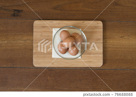 eggs in a glass bowl 76688088