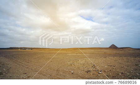 Far view Red Pyramid from Bent pyramid showing landmark architecture on desert landscape 76689016