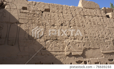 The Great Karnak Inscription ancient Egyptian large hieroglyphic wall in Karnak temple Egypt Luxor The Great Karnak Inscription ancient Egyptian large hieroglyphic wall in Karnak temple Egypt Luxor 76689288
