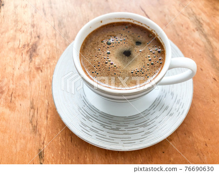 cup of turkish coffee on a wooden table cup of turkish coffee on a wooden table 76690630