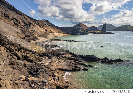Pinnacle Rock and the volcanic landscape - Bartolome - Galapagos Islands 76692298