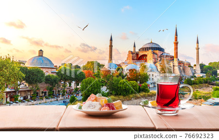 Traditional turkish tea in front of the Hagia Sophia Mosque, Istanbul Traditional turkish tea in front of the Hagia Sophia Mosque, Istanbul 76692323