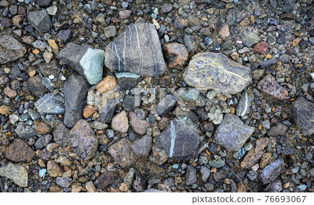 Multicolored mineral rocks near abandoned asbestos mine in Amiantos, Cyprus 76693067