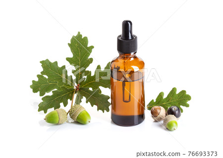 Acorn essential oil isolated on white background 76693373