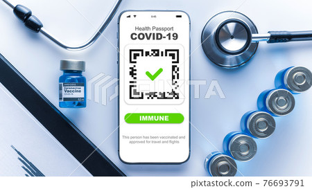 Covid passport. Coronavirus vaccination certificate of immunity passport on smartphone screen with doctor stethoscope, healthcare charts, syringe and medical equipment on hospital white background. 76693791