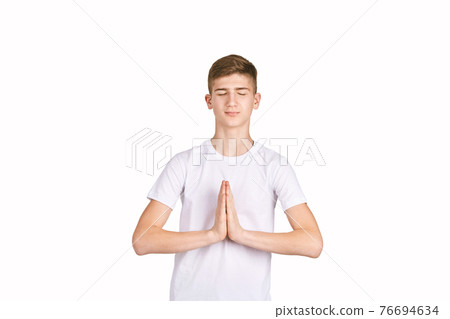 Children portrait in white t-shirt. Studio isolated concept Children portrait in white t-shirt. Studio isolated concept 76694634