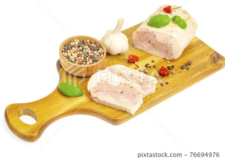 Homemade chicken fillet meat roll with vegetables and spices 76694976