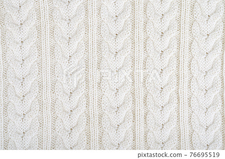 Background knitted fabric, pattern with pigtails. Photo 76695519