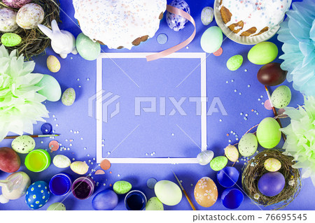 Colorful background with Easter eggs on blue background. Happy Easter concept. Can be used as poster, background, holiday card. Flat lay, top view, copy space. Studio Photo Colorful background with Easter eggs on blue background. Happy Easter concept. Can be used as poster, background, holiday card. Flat lay, top view, copy space. Studio Photo 76695545