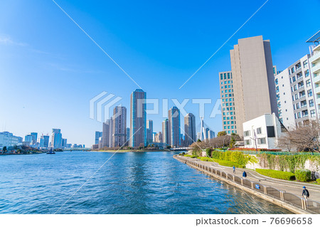 Tokyo cityscape The skyscrapers of Tsukuda Island as seen from Eidai Bridge 76696658