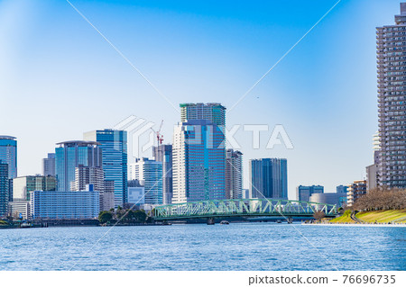 Tokyo cityscape The skyscrapers of Tsukudajima and Toyosu as seen from the Sumida River Terrace 76696735
