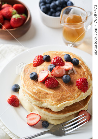 Panque with strawberries and blue berry Panque with strawberries and blue berry 76697472