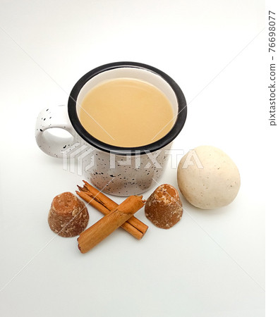 beverage called "atole" Made from corn dough, piloncillo and cinnamon. Top view 76698077