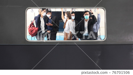 people with mask travel Public electric train, Businessman or woman wearing white facial mask during travel by Public electric train, new normal life style during covid-19 pandemic 76701506