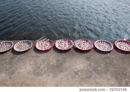 Drying fish on the banks of Namdaecheon Drying fish on the banks of Namdaecheon 76701546