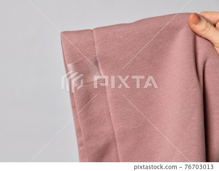 Closeup of pink hood, cowl top fabric with blank Closeup of pink hood, cowl top fabric with blank 76703013