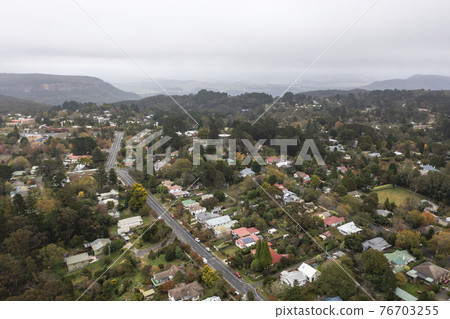 Drone aerial photograph of low clouds over The Blue Mountains 76703255