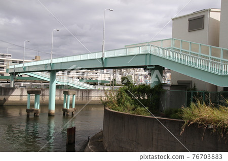 "Neyagawa pedestrian bridge" over the Neyagawa "Neyagawa pedestrian bridge" over the Neyagawa 76703883