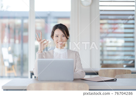 Female working coworking space Female working coworking space 76704286