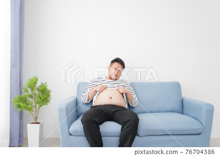 Overeating and obese men 76704386