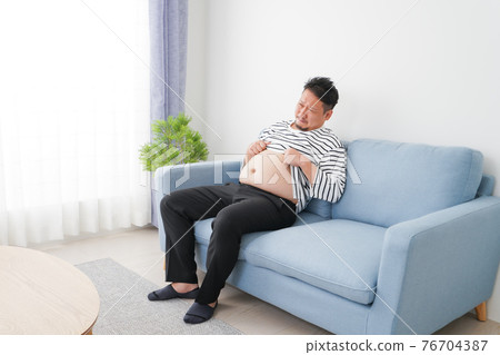 Overeating and obese men 76704387